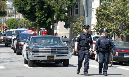 San Francisco, CA - April 29, 2023: Unidentifed participants in the annual Cesar Chavez Parade driving from Delores Park through the Mission District.のeditorial素材