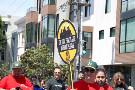 San Francisco, CA - April 29, 2023: Unidentifed participants in the annual Cesar Chavez Parade driving from Delores Park through the Mission District.のeditorial素材