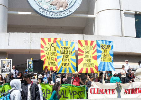 San Francisco, CA - April 21, 2023: Unidentified participants of Youth vs Apocalypse Climate protest in front of the Superior Courthouse.のeditorial素材