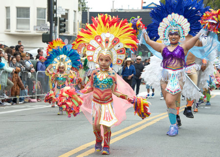 San Francisco, CA - May 28, 2023: Unidentified participants in the 45th annual Carnaval Grand Parade...