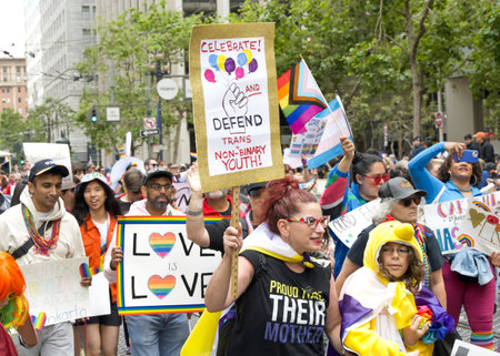San Francisco, CA - June 24, 2023: Participants celebrate at the SF Gay Pride Parade up Market  St...
