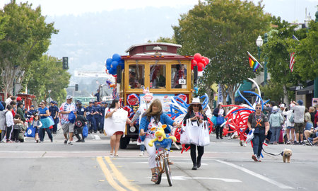 Alameda, CA - July 4, 2023: Alameda 4th of July Parade, one of the largest and longest Independence Day parade in the nation. Unidentified participants.のeditorial素材