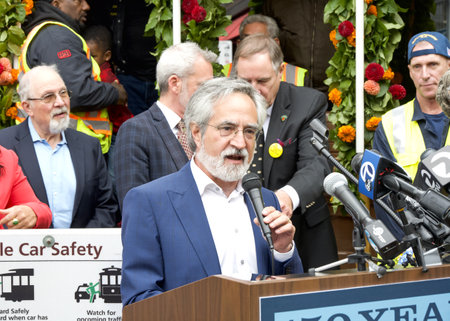 San Francisco, CA - Aug 2, 2023: Supervisor Aaron Peskin speaking at the 150th celebration of the First Cable Car Ride in the city.のeditorial素材