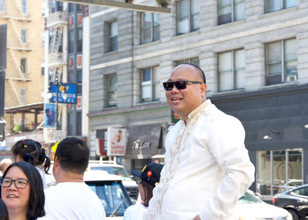 San Francisco, CA - Aug 12, 2023: Councilmember Mark Nagales in the 30th annual Pistahan Parade, a colorful display of Filipino community pride and diversity.のeditorial素材