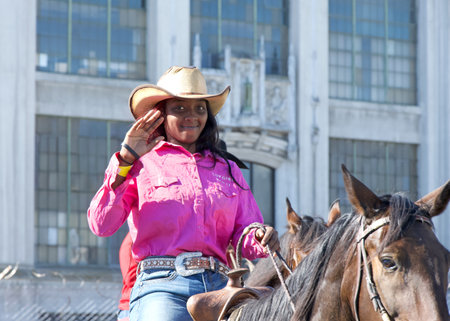 Oakland, CA - Oct 7, 2023: Participants in 49th annual Black Cowboy parade, hosted by the Oakland Black Cowboy Association, promoting the contributions of people of color to the Old West.のeditorial素材
