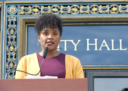 San Francisco, CA - Oct 16, 2023: Director Kimberly Ellis speaking at a Press conference during a Domestic Violence Awareness Month Rally outside City Hall.のeditorial素材