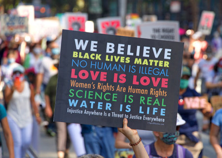San Francisco, CA - Oct 17, 2020: Unidentified participants in the Women's March. Designed to engage and empower all people to support women's rights, to encourage vote in the 2020 elections.のeditorial素材