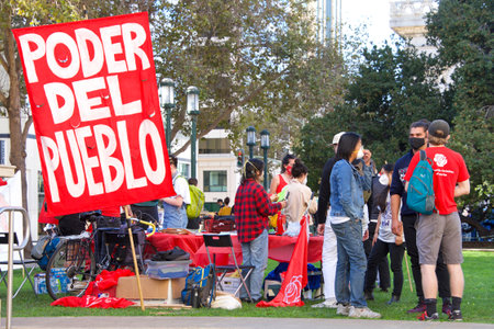 Oakland, CA - Nov 4, 2020: Unidentified participants of the DEFEND THE VOTE rally at Oscar Grant Plaza.のeditorial素材