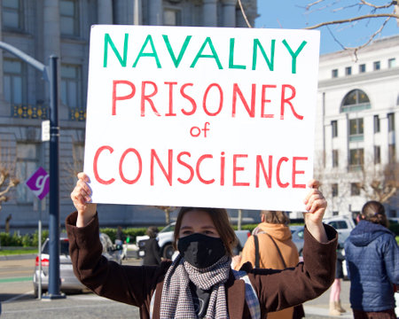 San Francisco, CA - Jan 23, 2021: Unidentified protesters outside City Hall at Civic Center Plaza...