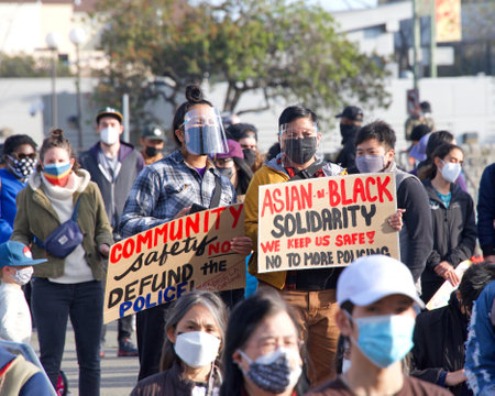 Oakland, CA - Feb 13, 2021: Unidentified participants at the Love Our People Heal Our Communities...