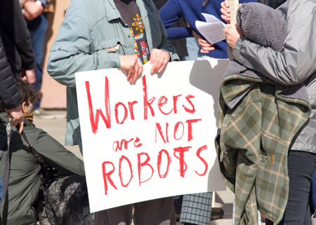 Oakland, CA - Feb 20, 2021: Unidentified participants protesting Amazon's treatment of employees and...