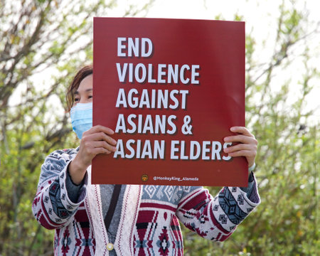 Alameda, CA - March 24, 2021: Unidentified participants at a youth lead anti-Asian Violence March, walking from the beach to City Hall. For a rally.のeditorial素材