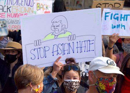 San Francisco, CA - Mar 26, 2021: Hundreds of unidentified participants at a youth lead anti-Asian...