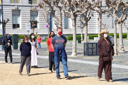 San Francisco, CA - Mar 21, 2021: Unidentified participants at the Sit, Walk, Listen rally at Civic Center after the Atlanta spree shooting of women in Atlanta.のeditorial素材