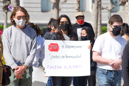 San Francisco, CA - Mar 21, 2021: Unidentified participants at the Sit, Walk, Listen rally at Civic...