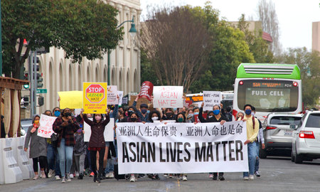 Alameda, CA - March 24, 2021: Unidentified participants at a youth lead anti-Asian Violence March,...