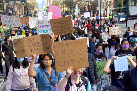 San Francisco, CA - Mar 26, 2021: Hundreds of unidentified participants at a youth lead anti-Asian...