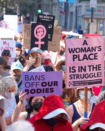 San Francisco, CA - Oct 02, 2021: Unidentified participants in the Women's March for Reproductive Rights holding signs marching down down Market Street in San Francisco.のeditorial素材