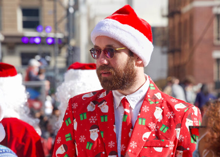 San Francisco, CA - Dec 11, 2021: Unidentified participants in the 27th annual Santa Con, held at Union Square. An annual city wide Santas only pub crawl and toy donation to charity.のeditorial素材