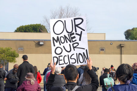 Oakland, CA - Feb 5, 2022: Unidentified participants holding signs at Prescott Elementary School,...