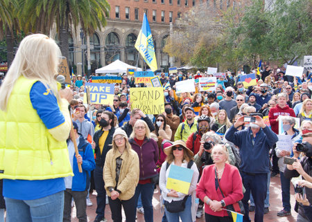 San Francisco, CA - Feb 26, 2022:  Unidentified participants at United We Stand For Ukraine Protest holding signs. Advocating for solidarity with the people of Ukraine against Russian aggression.のeditorial素材