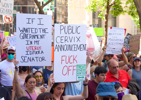 San Francisco, CA - May 14, 2022: Unidentified participants marching in the streets holding signs in support of Reproductive Justice and a Womanâs Right to Choose.のeditorial素材