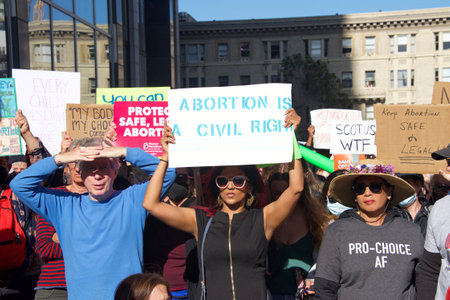 San Francisco, CA - May 3, 2022: Participants at Womenâs Rights Protest after SCOTUS leak, plan to overturn Roe v Wade. Holding signs protesting the leaked plan to overturn Roe v Wadeのeditorial素材