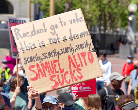 San Francisco, CA - May 14, 2022: Unidentified participants marching in the streets holding signs in support of Reproductive Justice and a Womanâs Right to Choose.のeditorial素材