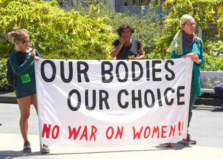 San Francisco, CA - July 17, 2022: Unidentified participants in Abortion Rights Protest Rally at Union Square, speaker promoting action for Abortion Rights.のeditorial素材