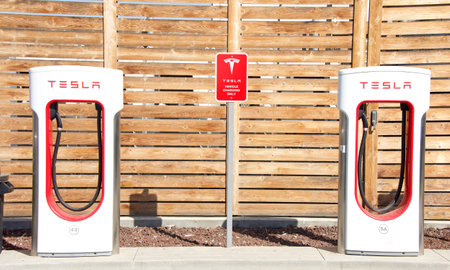Bakersfield, CA - Oct 7, 2022: Tesla Super Charging station on Stockdale Hwy and the 5 fwy. Tesla...