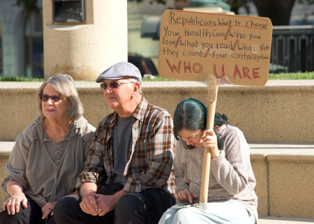 Oakland, CA - Oct 8, 2022: Unidentified participants at a Women's Rights for Reproductive rights Rally at Frank H. Ogawa Plaza in Oakland, CAのeditorial素材