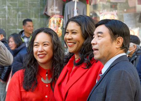 San Francisco, CA - Feb 6, 2024: Mayor London Breed posing with constituents for photos in Chinatown after the press conference held there.のeditorial素材