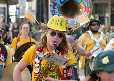 San Francisco, CA - March 16, 2024: Unidentified participants in the 173rd annual St Patricks Day parade. The West Coasts largest Irish even celebrating Irish culture.のeditorial素材