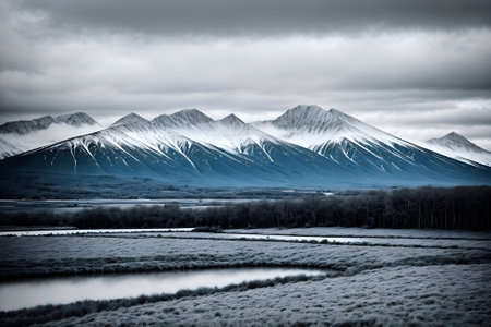 Snowy mountains and river in winter, Iceland. Toned.の素材