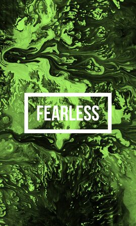 Fearless motivational quote on abstract liquid background.の写真素材