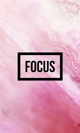 Focus motivational quote on abstract liquid background.