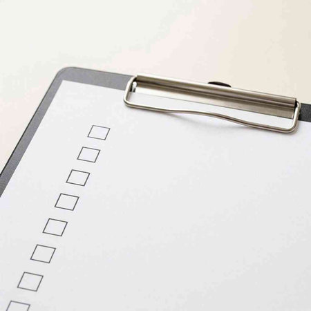 Clipboard with checklist and pen on white background. Copy space.
