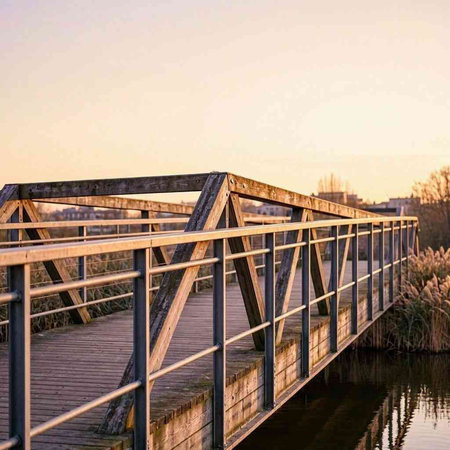A bridge over the river in the Netherlands at sunset with copy space