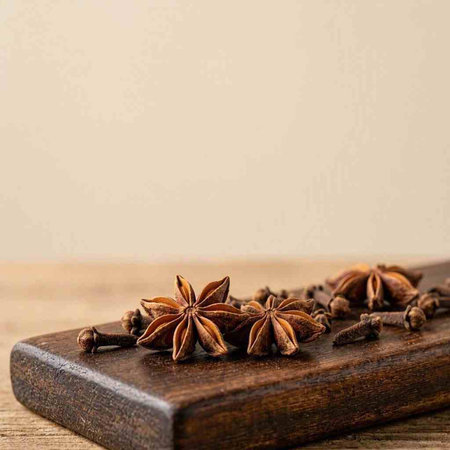 Star anise. Spices on a wooden board. Selective focus.