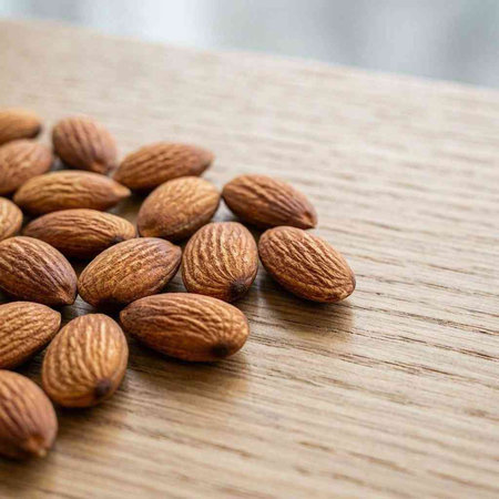 Almonds on a wooden background. Selective focus. Nature.