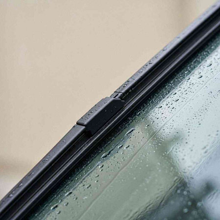 Rain drops on a car glass. Raindrops on the glass.