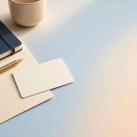 Blank business cards, coffee cup and notebook on white background.