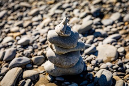 River Rocks Stacked and Balanced on Top of Each Otherの写真素材