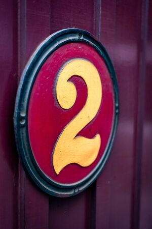 A Gold Number 2 on a Big Round Discの写真素材