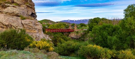Ophir Bridge And THe Southern Alps In The South Island Of New Zealand