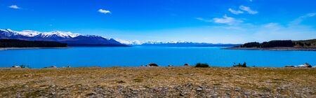 A Stunning Day On Lake Pukaki With The Southern Alps Reaching To The Skyの写真素材