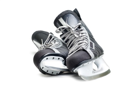 Man's hockey skates. Isolated on white background.の写真素材