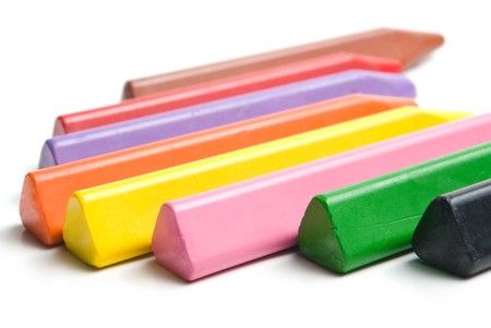Multicolored crayons. Isolated on white background.