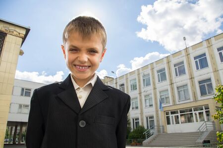 Little schooler smiling at school yard の写真素材