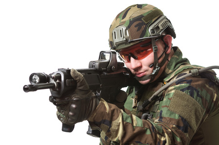 NATO soldier in full gear  Military man isolated over white background 